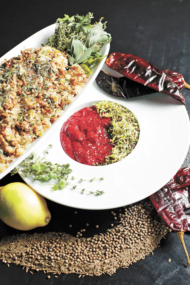 A new twist on Thanksgiving staples: stuffing fried rice and cranberry harissa sauce. - YOUNG KWAK PHOTO