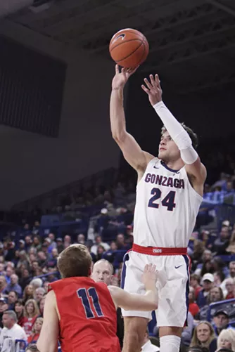 Gonzaga forward Corey Kispert shoots over Lewis-Clark State guard Hodges Bailey during the first half of an exhibition game in Spokane on Nov. 1. - YOUNG KWAK PHOTO