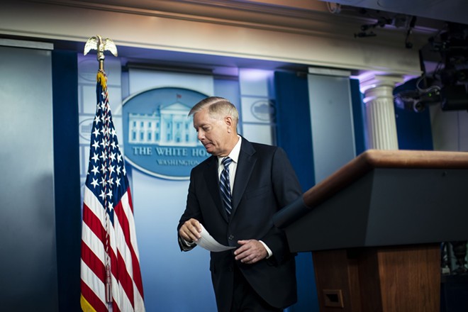 Sen. Lindsey Graham (R-S.C.) after speaking to reporters at the White House following President Donald Trump's announcement of a commando raid in Washington, Oct. 27, 2019. In the space of a few weeks, Graham has gone from expressing an open mind about impeachment to angrily denouncing the inquiry. - AL DRAGO/THE NEW YORK TIMES