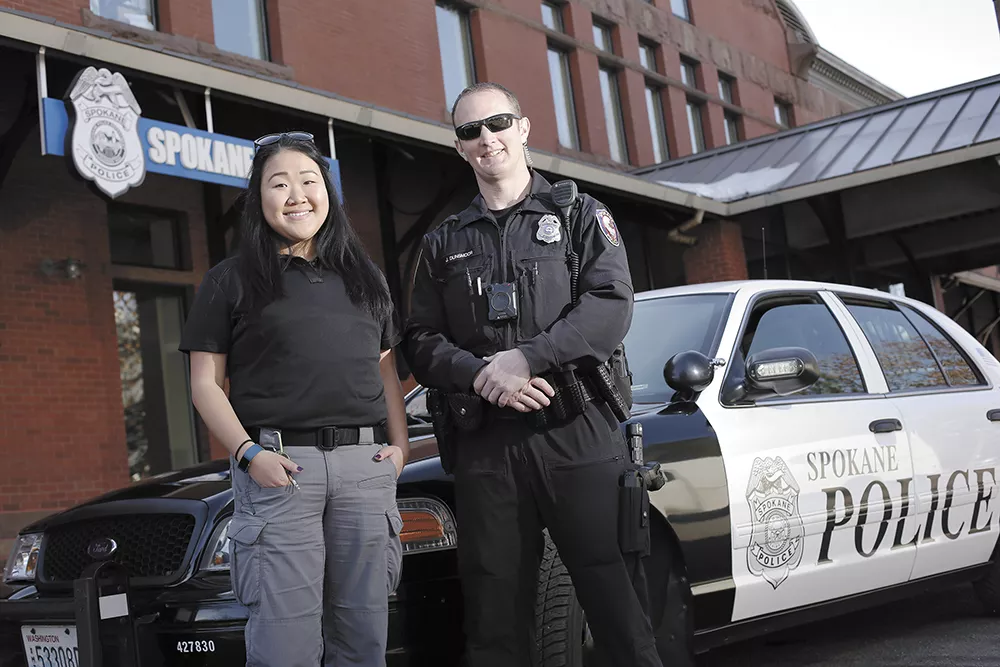 Jae Dobbs, a mental health clinician with Frontier Behavioral Health, and SPD Officer Joe Dunsmoor working as one of the department's co-deployed teams. - YOUNG KWAK
