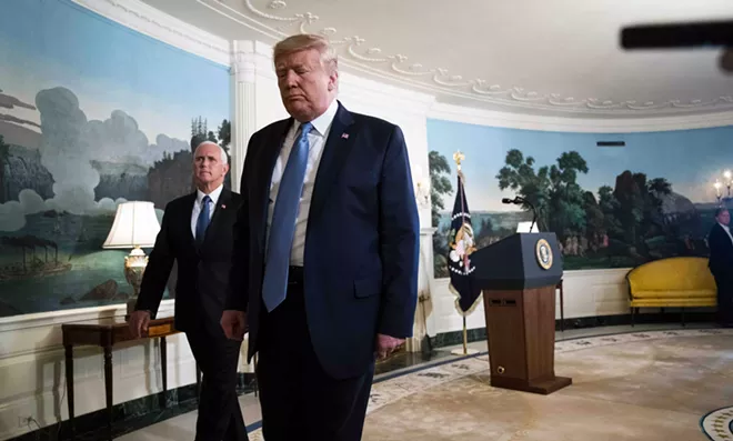 President Donald Trump, accompanied by Vice President Mike Pence, leaves after delivering a statement at the White House on Monday, Aug. 5, 2019, about the twin mass shootings over the weekend. Trump forcefully denounced white supremacy in the wake of the shootings, citing the threat of “racist hate” with no acknowledgement that his own anti-immigrant rhetoric has become part of a national debate. - DOUG MILLS/THE NEW YORK TIMES
