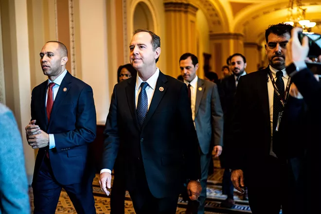Reps. Hakeem Jeffries (D-N.Y.), left, and Adam Schiff (D-Calif.) walk with other House impeachment managers to do a walkthrough of the Senate floor and their office space on the Senate side of the Capitol they will use during the impeachment trial of President Donald Trump in Washington on Monday, Jan. 20, 2020. - ERIN SCHAFF/THE NEW YORK TIMES