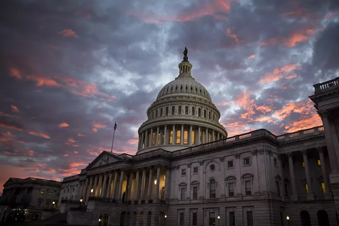 The Capitol building at sunset in Washington, Nov. 6, 2018. The federal budget deficit continued to rise in the first quarter of fiscal 2019 and is on pace to top $1 trillion for the year, as President Donald Trump’s signature tax cuts continue to reduce corporate tax revenue, data released on Jan. 8, 2019, shows. - SARAH SILBIGER/THE NEW YORK TIMES