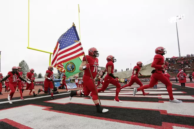 Eastern Washington offensive lineman Matt Meyer (70) and his teammates run onto the field before an NCAA Football Champion Subdivision quarterfinal game in Cheney, Wash., Saturday, Dec. 8, 2018. - YOUNG KWAK PHOTO