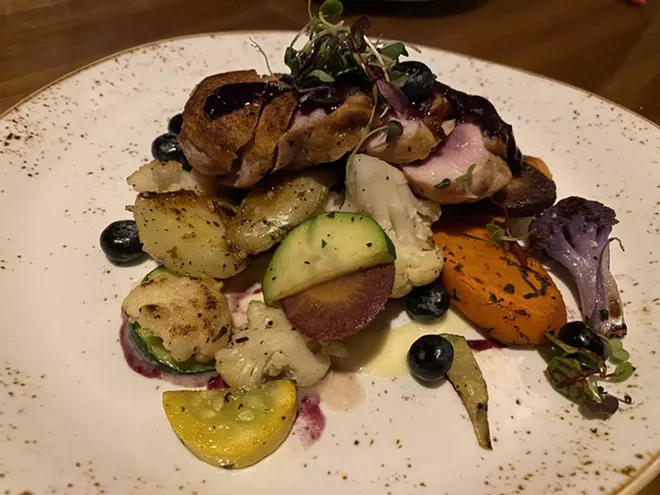 Blueberry duck breast with blueberry gastrique, fingerling potatoes and local vegetables. - SAMANTHA WOHLFEIL