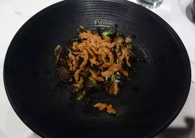 This picture doesn't do the crispy Brussels sprouts justice. The dijon gastrique and crispy onions are great additions. - DAN NAILEN PHOTO