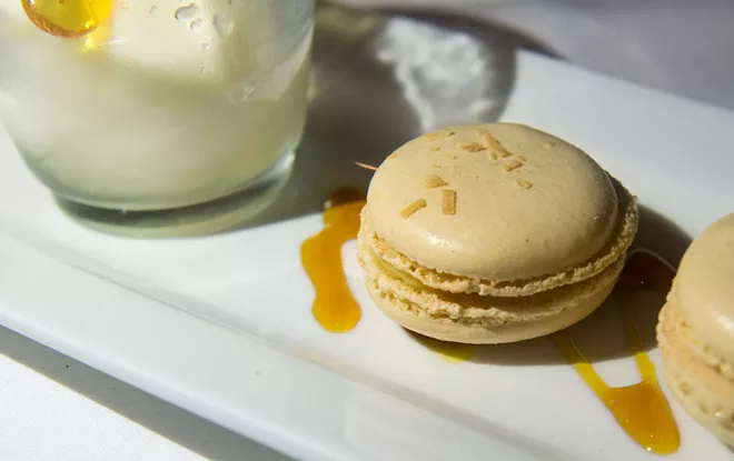 "Housemade lemon sorbet served with a couple of coconut Parisian macarons filled with pineapple curd" - DANIEL WALTERS PHOTO