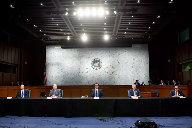 From left: Secretary of Labor Eugene Scalia, Senate Majority Leader Sen. Mitch McConnell (R-Ky.), Treasury Secretary Steve Mnuchin, Sen. Chuck Schumer (D-N.Y.), and White House advisor Larry Kudlow attend a meeting about the CARES Act - the Coronavirus Aid, Relief, and Economic Security Act, in Washington, Friday, March 20, 2020. - ERIN SCOTT/THE NEW YORK TIMES