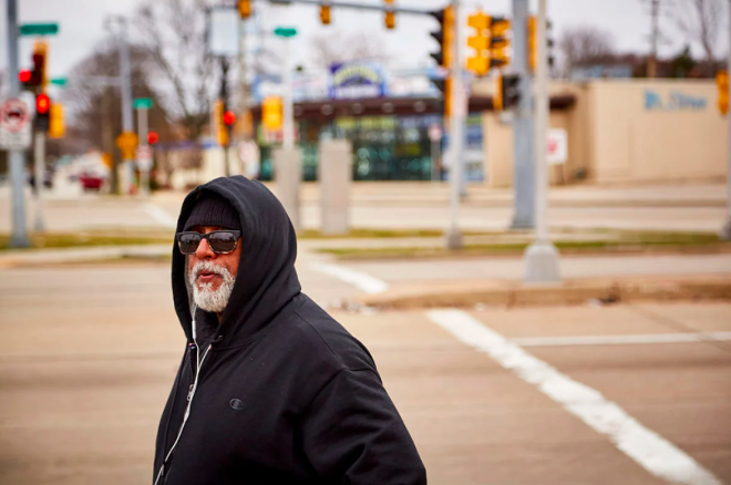 Fred Royal, the Milwaukee head of the NAACP, walks empty streets near his home in a largely black neighborhood hit hard by the coronavirus. He knows three people who have died. - DARREN HAUCK FOR PROPUBLICA