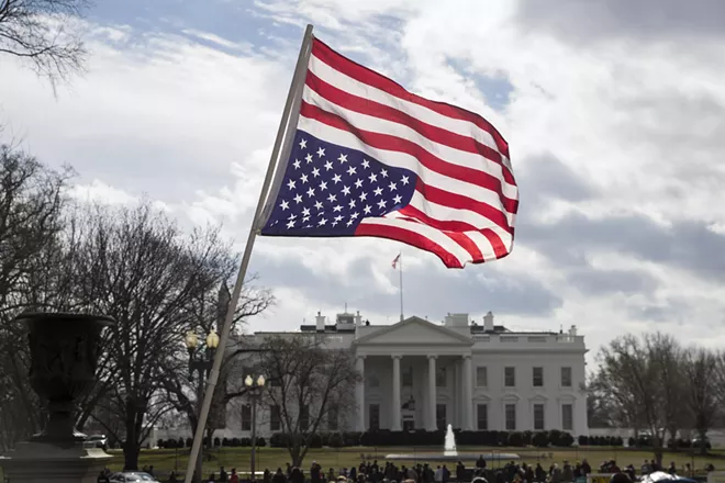 An upside-down American flag in front of the White House in Washington, Feb. 18, 2019. - SARAH SILBIGER/THE NEW YORK TIMES