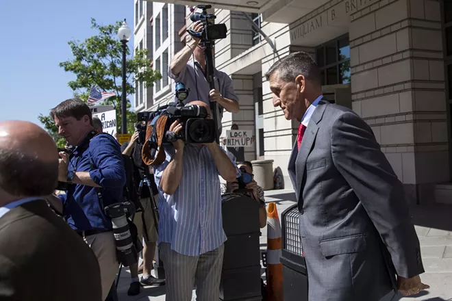 Trump praises Barr for dropping charges against Flynn