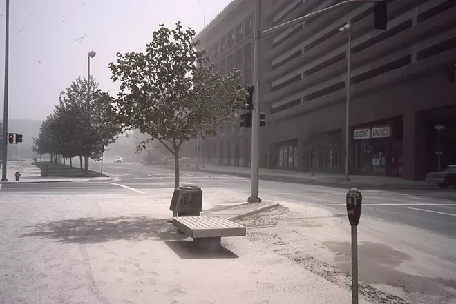 Downtown Spokane seen dusted in ash the following day, Monday, May 19, 1980. This photo was taken at the corner of Post St. and Spokane Falls Blvd., at City Hall, looking east. - COURTESY ROGER CRUM