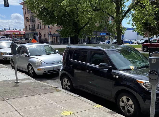 If you thought that Spokane meter time limits weren't being enforced while meter parking fare wasn't being collected, you'd be wrong, apparently. - SAMANTHA WOHLFEIL PHOTO