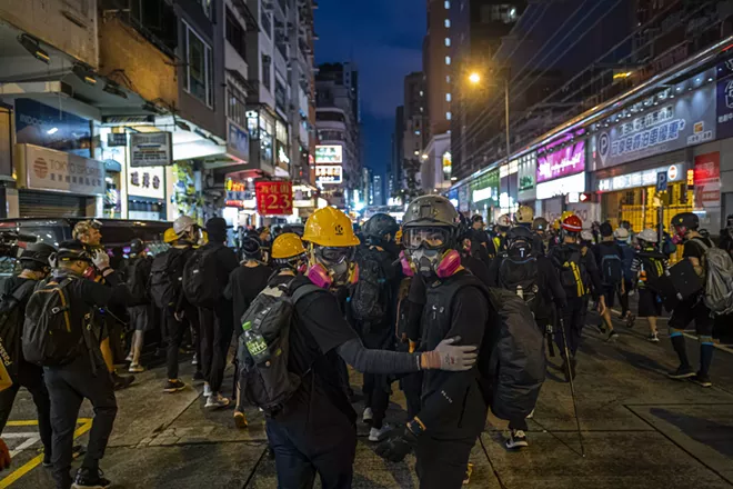 Protesters outside the Mong Kok police station in Hong Kong, Aug. 17, 2019. China is moving to impose new national security laws that would give the Communist Party more authority in Hong Kong, a proposal announced on May 21, 2020. - LAM YIK FEI/THE NEW YORK TIMES