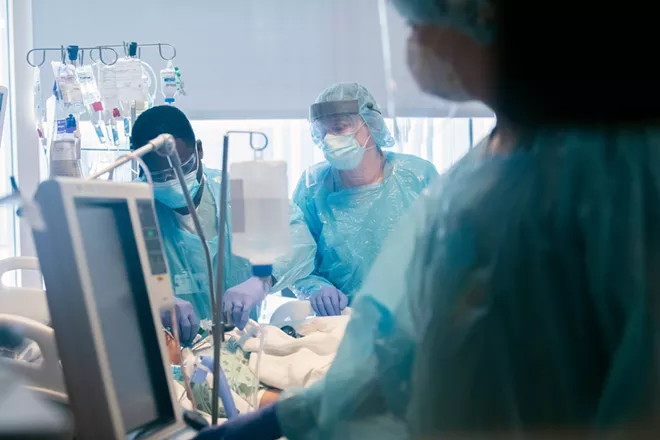 A photo provided by Northwestern Medicine shows an extracorporeal membrane oxygenation, or ECMO, room, where coronavirus patients struggling to breathe are treated, at a Northwestern Medicine facility in Chicago. A young woman whose lungs were destroyed by the coronavirus received a double lung transplant last week at Northwestern Memorial Hospital in Chicago, the hospital reported on Thursday, June 11, 2020, the first known lung transplant in the United States for COVID-19. - NORTHWESTERN MEDICINE VIA THE NEW YORK TIMES