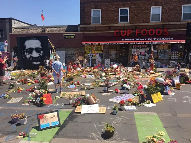 Memorials to George Floyd outside the Minneapolis convenience store where he was killed. - MATT SLATER