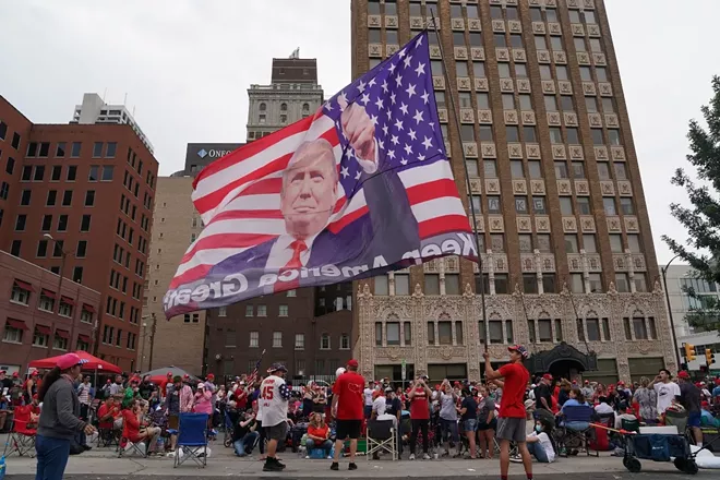 A crowd gathers near the BOK Center in Tulsa, Okla., on Saturday, June 20, 2020, where President Donald Trump will hold his first campaign rally since March 2. Trump is determined to try to have a political comeback rally in spite of the devastating health and economic crises that have unfolded on his watch, as well as the nationwide protests against racism that have left him on the defensive. - ERIN SCHAFF/THE NEW YORK TIMES