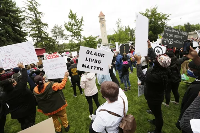 People gathered May 31 for the first of a series of protests against police brutality in the wake of George Floyd's death at the hands of police in Minneapolis. - YOUNG KWAK PHOTO