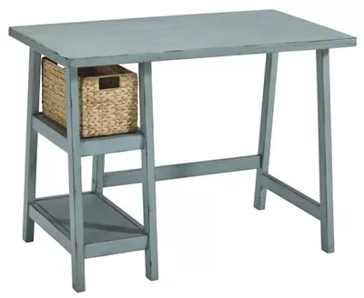 DESK PICK: Add a little whimsy with this petite, but perfectly functional desk. — Signature Design Mirimyn Trestle Desk, Runge Furniture in Coeur d'Alene