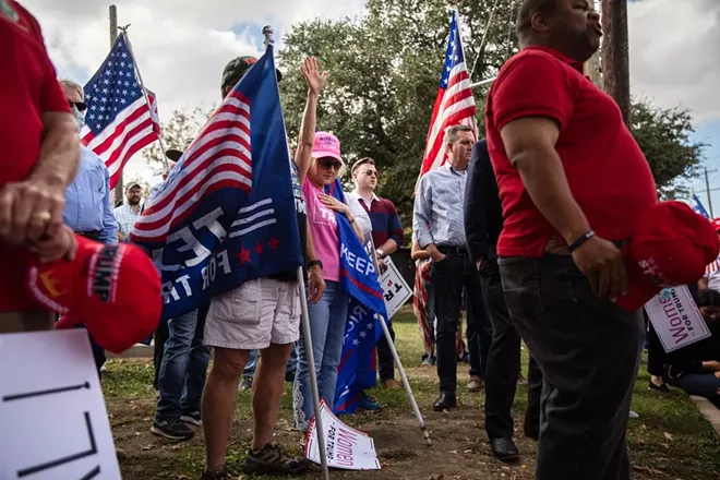 Supporters of President Donald Trump gather near the Dallas County Elections office in Dallas, during a "Stop the Steal" protest on Nov. 9, 2020. Joe Biden promised not only to win, but to “restore the soul of the nation.” Even with his victory, the deep divisions that animated Trump’s tenure show no signs of receding. - TAMIR KALIFA/THE NEW YORK TIMES