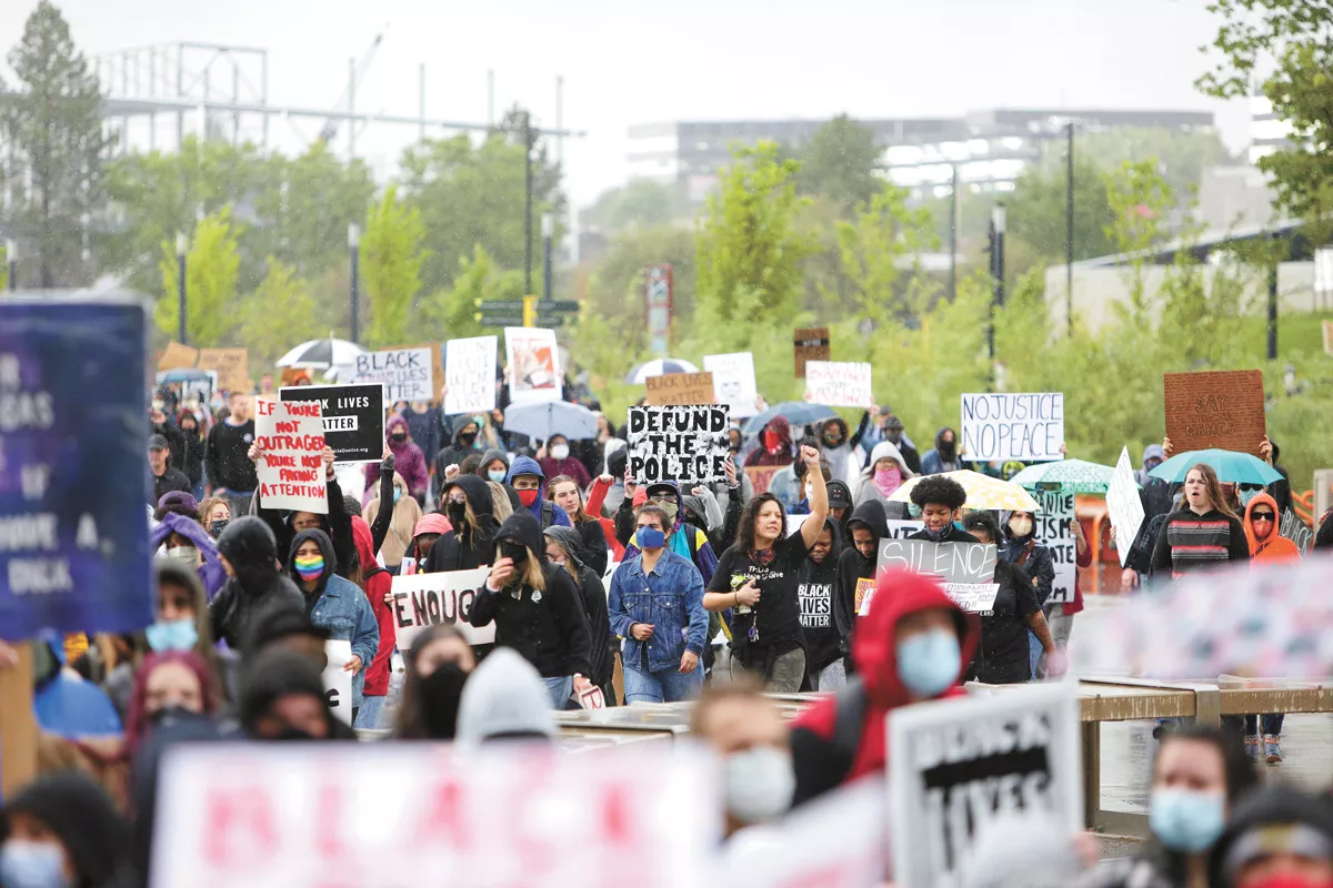 Most Democrats, from Joe Biden on down, celebrated Black Lives Matter activism while distancing themselves from the "Defund the Police" slogan seen at Spokane protests and across the country. But Republicans tried to tie even moderate Democrats to that slogan anyway. - YOUNG KWAK PHOTO