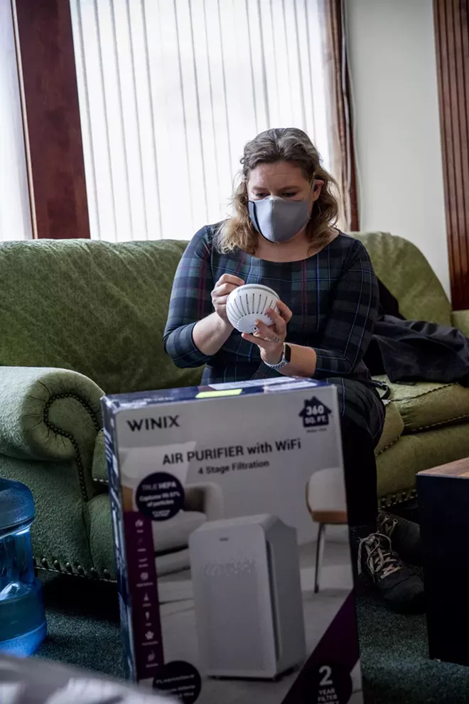 Sarah Schacht with some of the improvements — including an air purifier — that she has added to the commercial buildings she owns in Oak Harbor, Nov. 17, 2020. - DOROTHY EDWARDS/CROSSCUT
