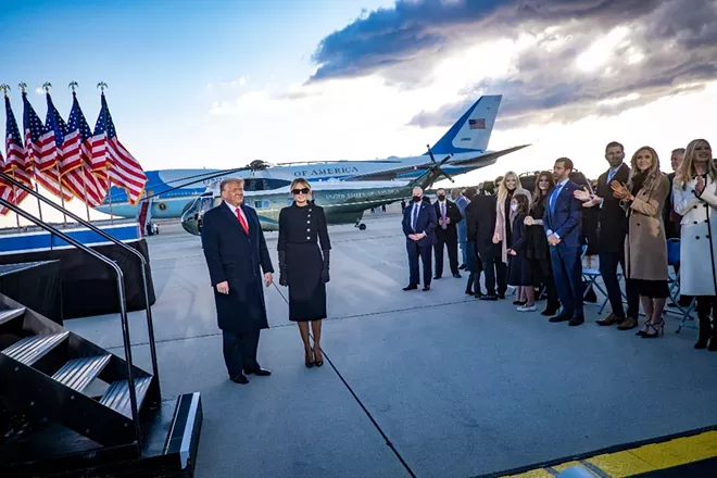Then-President Donald Trump and first lady Melania Trump at Joint Base Andrews, Md., before boarding Air Force One for the last time in office, Jan. 20, 2021. - PETE MAROVICH/THE NEW YORK TIMES