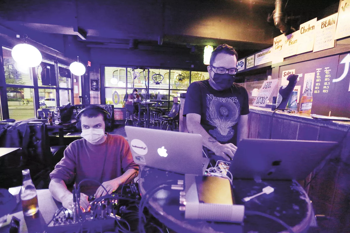 Norman Robbins (left) and Luis Mota during one of the livestreamed shows at Neato Burrito. - YOUNG KWAK PHOTO