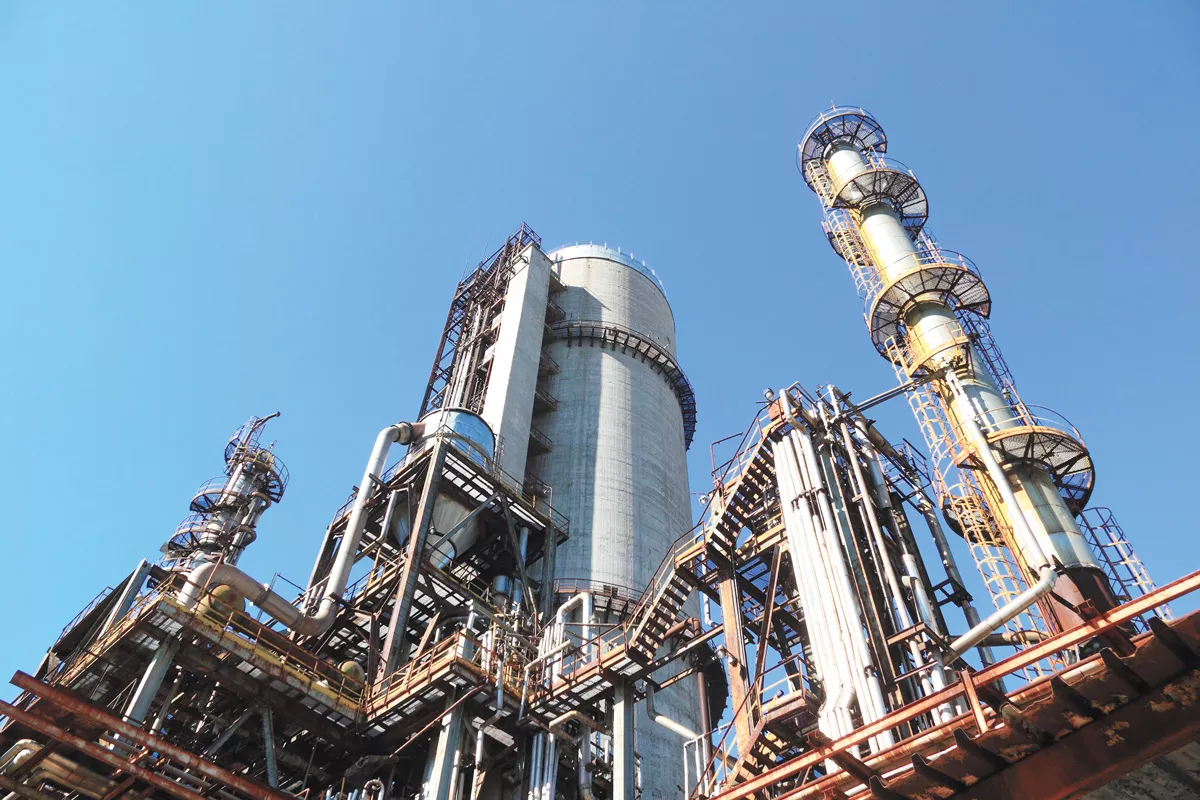 Oil refiners and fuel importers will have to help pay for cleaner fuels that will eventually replace gasoline under Washington's new clean fuel standard.