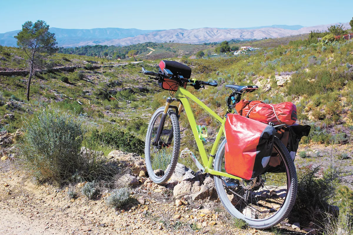 With a little bit of practice and the right equipment, it's actually not that hard to carry some basic camping gear.