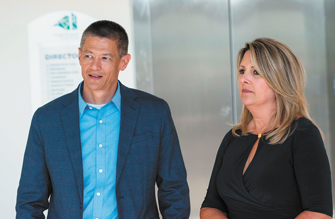 Vacancies and turnover in high-level positions have made City Spokesman Brian Coddington, left, a particularly influential figure in Nadine Woodward's administration. - DANIEL WALTERS PHOTO