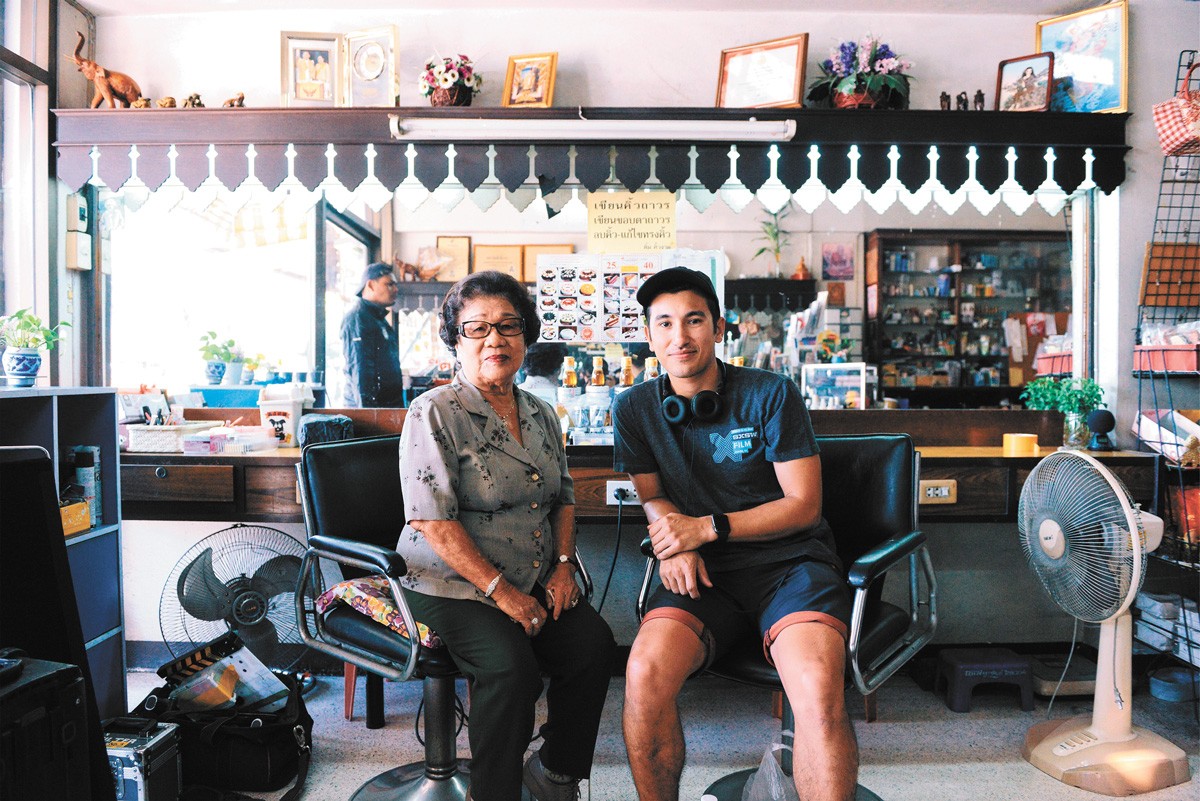 Filmmaker Champ Ensminger and his grandmother Ninlawan Pinyo.