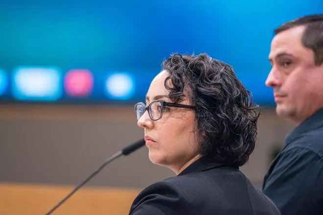 Community Housing and Human Services employees Tim Sigler (right) and Tija Danzig (left) in 2019. Both Sigler and Danzig left early this year — but their departures were only the first of many. - DANIEL WALTERS PHOTO