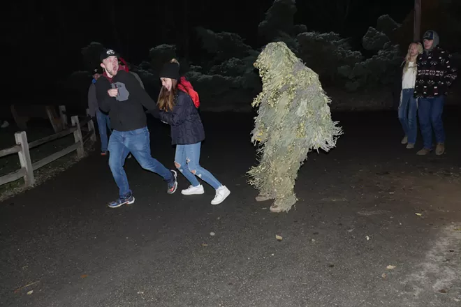 Jordan Carter enjoys putting on his ghillie suit and spooking folks at Scarywood. - COURTESY SILVERWOOD THEME PARK