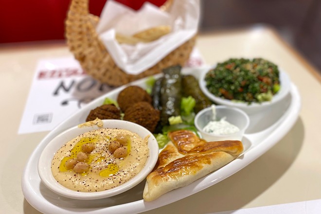 Lebanon Cafe's sampler platter includes hummus, dolmades, falafel and more. - CARRIE SCOZZARO PHOTO