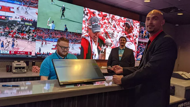 Gonzaga great Robert Sacre placed the first bet at Northern Quest's new sports book at a party Friday night. He took Alabama and the points in the Tide's matchup with Georgia Saturday. - DAN NAILEN