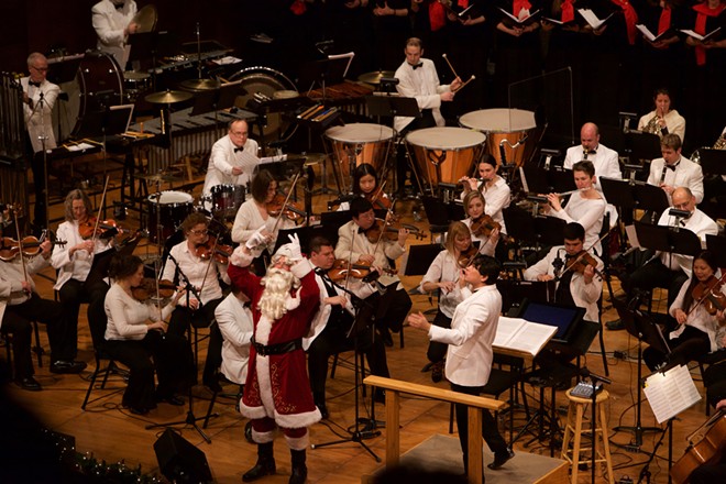 Sometimes Santa steals conductor Morihiko Nakahara's spotlight. - COURTESY PHOTO