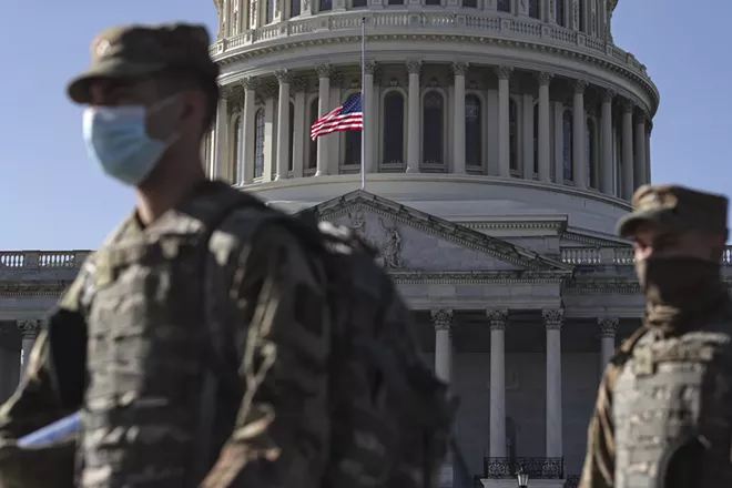 New York National Guard soldiers arrive near the U.S. Capitol building in the days following the Jan. 6, 2021 insurrection. - U.S. AIR NATIONAL GUARD PHOTO