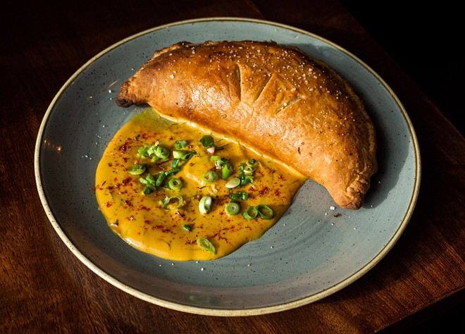 Vieux Carre's Louisiana chicken and leek handpie is featured as a second course option during Inlander Restaurant Week 2022. - ALYSSA HUGHES
