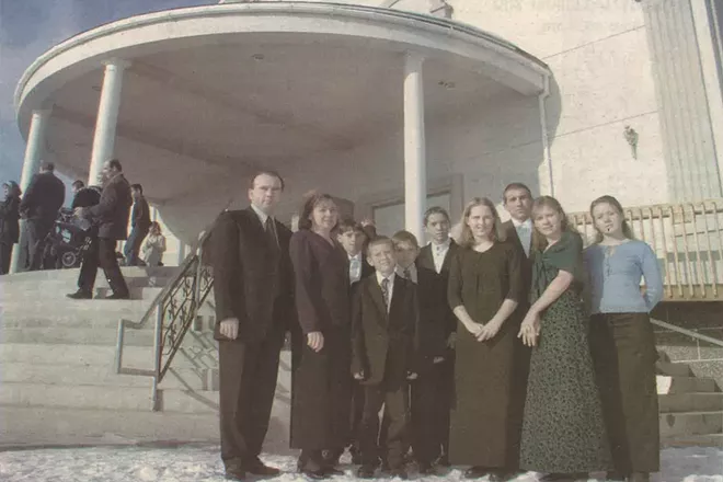 The Solodyankin family in front of the year-old Slavic Evangelical Baptist Church. - AMY SINISTERRA PHOTO