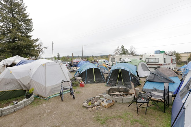 "Camp Hope" in East Spokane on state property has now grown to more than 400 residents. Even if every one of them moved into the proposed East Trent shelter, there still would be 150 unsheltered. - YOUNG KWAK PHOTO
