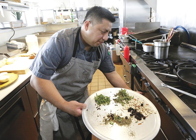 Chef Fredy Martinez preps ingredients for mole sauce. - YOUNG KWAK PHOTO