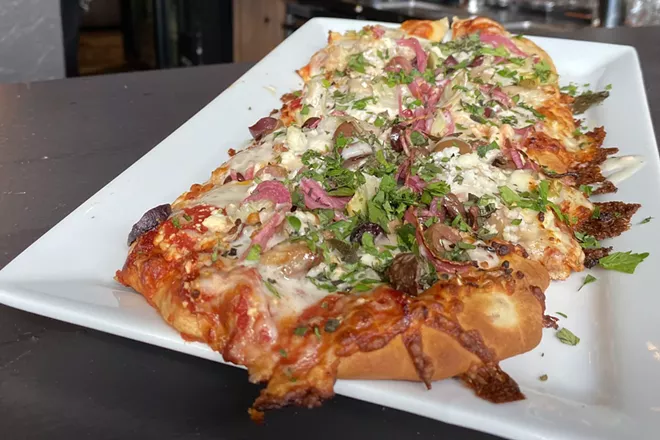 Grab a flatbread and a drink at the new Goat Lounge. - CARRIE SCOZZARO PHOTO