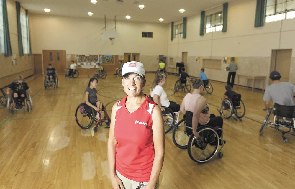"There's no reason they can't do anything they want," says Parasport Executive Director Teresa Skinner, with some of her athletes. - YOUNG KWAK