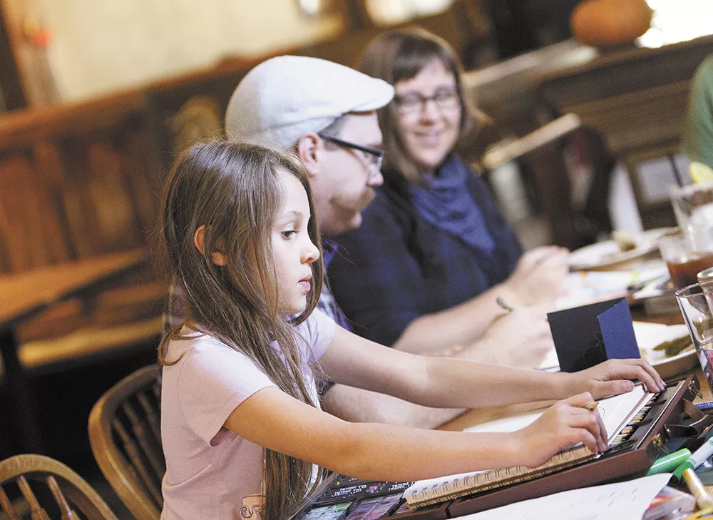 Tiffany Patterson (right) is making coloring cool again at her monthly Social Sketch events. |YOUNG KWAK photo