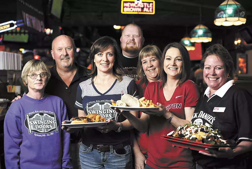 Owner Bob Materne (second from left), manager Lisa Ruggles (third from left) and the Swinging Doors' team. - YOUNG KWAK