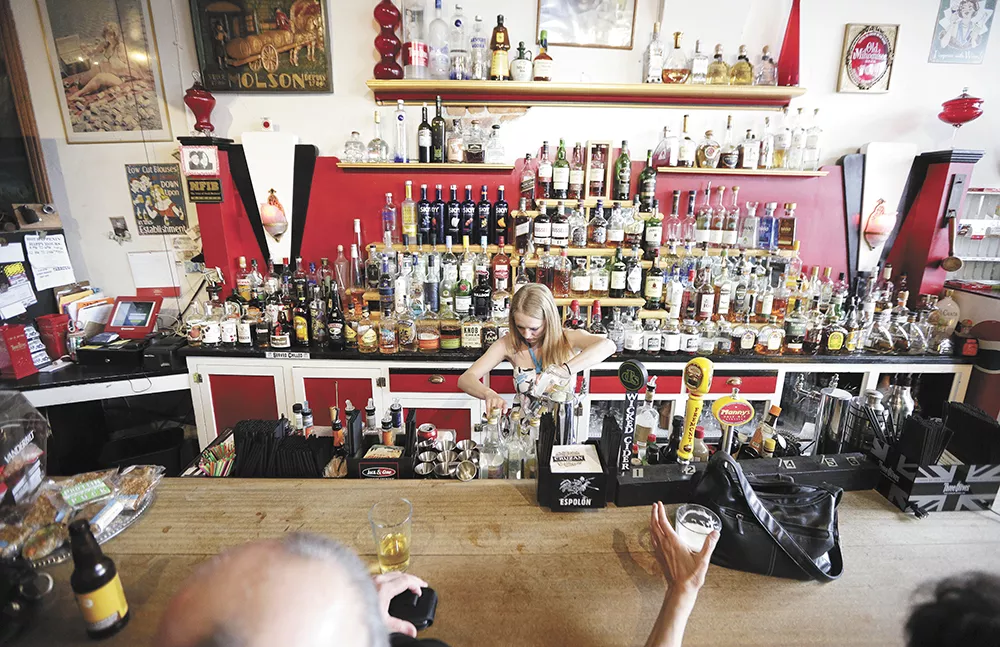 The Checkerboard Bar first opened in 1933. Brandy Miller can now be found behind the bar. - YOUNG KWAK