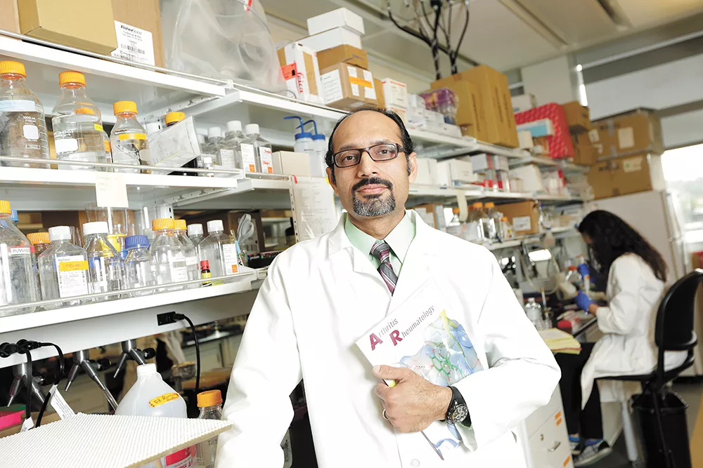 Salah-uddin Ahmed in his WSU Spokane lab: "You're always on the edge when you're in science." - YOUNG KWAK