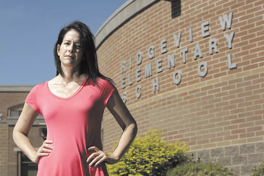 René Bross still doesn’t know why she found her 10-year-old son being restrained on the ground at Ridgeview Elementary School. - YOUNG KWAK
