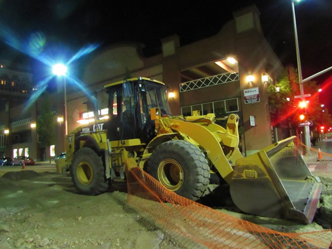 A bulldozer sits outside the Knitting Factory - DANIEL WALTERS PHOTO